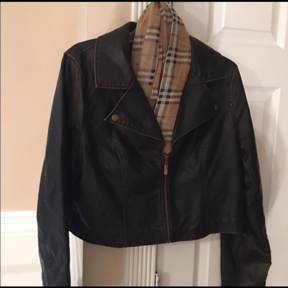 Dark Brown leather jacket likely worn!!